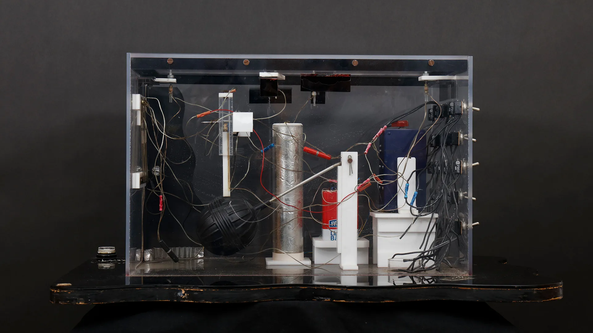 Transparent trial model associated with the Harvey's casino bombing, displayed against a dark background