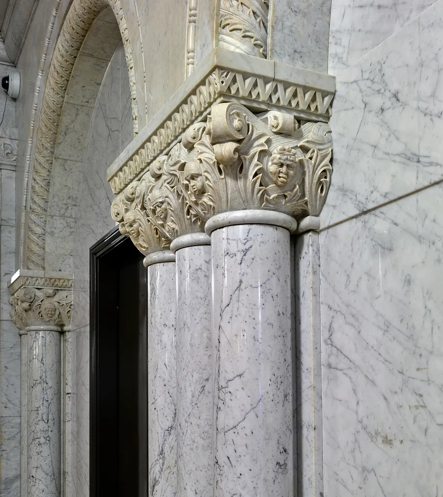 Carved marble column capitals inside Minneapolis City Hall