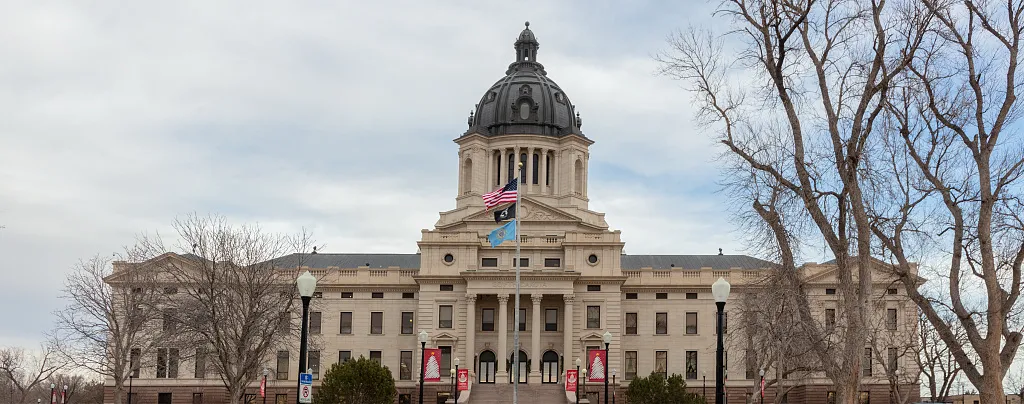 South Dakota State Capitol in Pierre, photographed from across its grounds