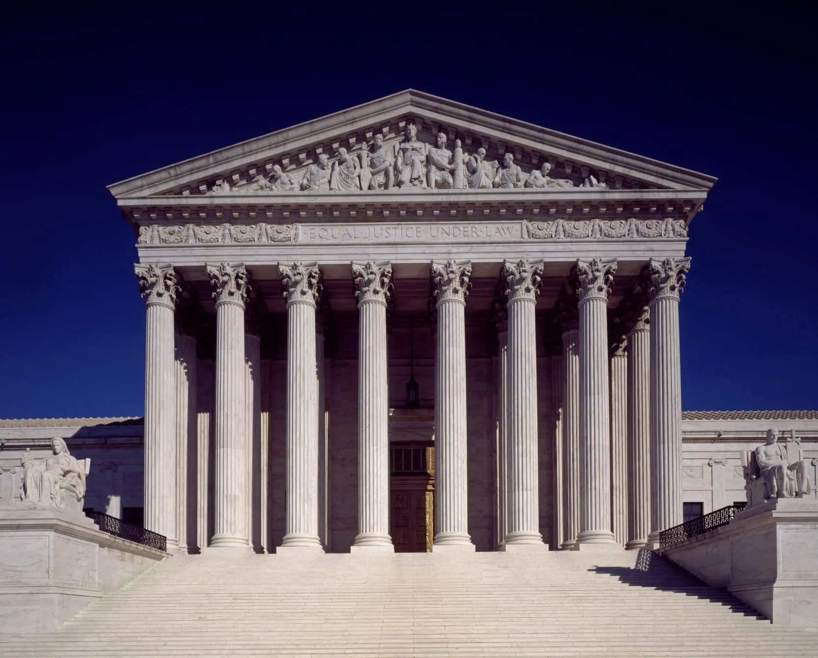 Columns and front steps of the U.S. Supreme Court, with Equal Justice Under Law carved above the entrance.